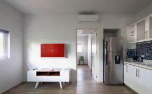 Kuchyň nebo kuchyňský kout v ubytování Azura Boutique Hotel