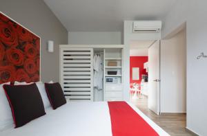 Postel nebo postele na pokoji v ubytování Azura Boutique Hotel