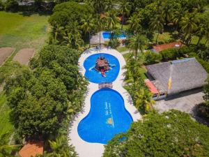 an overhead view of a swimming pool at a resort at Pato Canales Hotel & Resort in San Luis