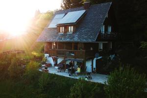 a house with solar panels on top of it at Ferienhaus "Am Wäldle" in Feldberg