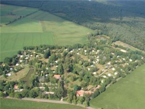 an aerial view of a town with trees and houses at Iglo Bungalow 36 in Chaam +3 photos