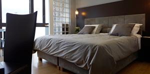 Кровать или кровати в номере Venere B&B