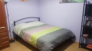 Voodi või voodid majutusasutuse Cozy Loft toas