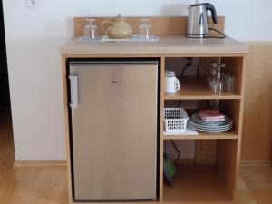 A kitchen or kitchenette at Pension Dagmar Tauplitz