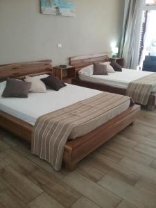Postel nebo postele na pokoji v ubytování Cahuita Inn