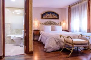 Postel nebo postele na pokoji v ubytování Casa de Reyes