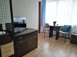 TV a/nebo společenská místnost v ubytování Villa Magna
