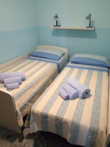 Katil atau katil-katil dalam bilik di Casa di Jerry Castellabate 2