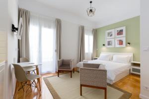 Posteľ alebo postele v izbe v ubytovaní Dinostratus House