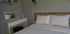 a bedroom with a bed and a fireplace at Palm beach Cannes Azur in Cannes