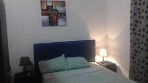 A bed or beds in a room at La Esperanza