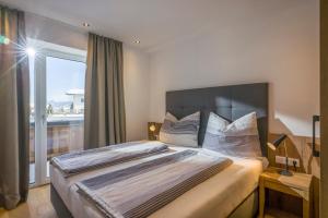 Posteľ alebo postele v izbe v ubytovaní Living 5 Walchsee