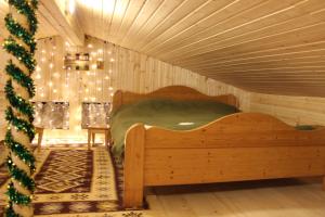 Ένα ή περισσότερα κρεβάτια σε δωμάτιο στο Bakuriani residence