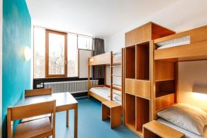 Postel nebo postele na pokoji v ubytování Jugendherberge Possenhofen