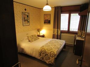 Postel nebo postele na pokoji v ubytování Hotel Meublè Meridiana