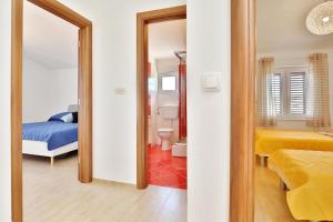 Postel nebo postele na pokoji v ubytování Villa ''Vana''