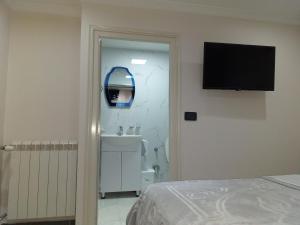 Postel nebo postele na pokoji v ubytování Hotel Erandi