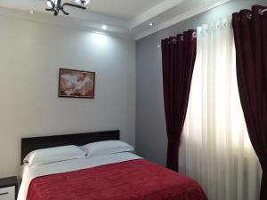 Postel nebo postele na pokoji v ubytování Hotel Erandi