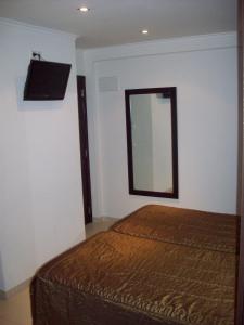 Postel nebo postele na pokoji v ubytování Residência São Francisco by Umbral