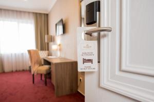 TV a/nebo společenská místnost v ubytování Hotel Alkor