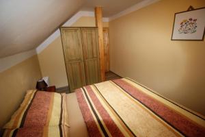 Postel nebo postele na pokoji v ubytování Apartmány u Knajflů