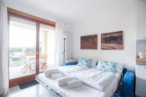 Posteľ alebo postele v izbe v ubytovaní Casa Davide