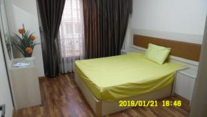 En eller flere senge i et værelse på Al Manar Flat Families only