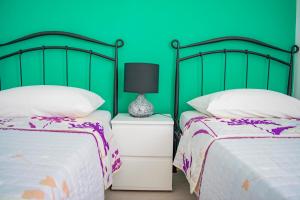 Postel nebo postele na pokoji v ubytování Apartments Šolta