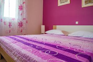 Postel nebo postele na pokoji v ubytování Apartments Šolta