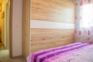 Postel nebo postele na pokoji v ubytování Apartments Šolta