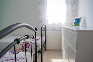 Postel nebo postele na pokoji v ubytování Apartments Šolta