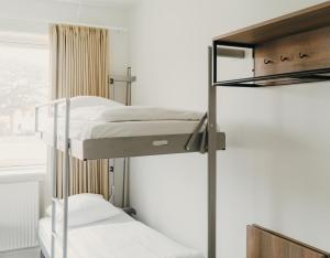 Letto o letti in una camera di Copenhagen Go Hotel