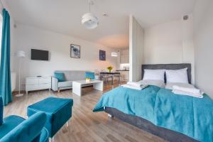 Posteľ alebo postele v izbe v ubytovaní Apartamenty Sun & Snow Seaside Grzybowo