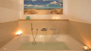 Ein Badezimmer in der Unterkunft East Cloud*****