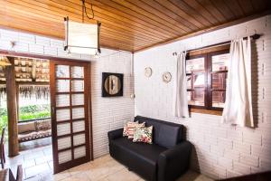 Uma área de estar em Pousada Cabanas Kaia Lua