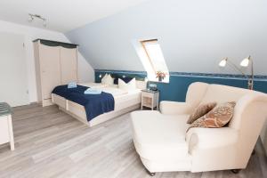 Posezení v ubytování Hotel Garni Am Deich