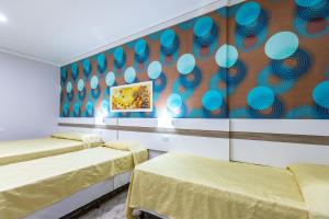 Postel nebo postele na pokoji v ubytování Hotel Trevita Foz