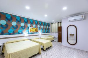 Postel nebo postele na pokoji v ubytování Hotel Trevita Foz