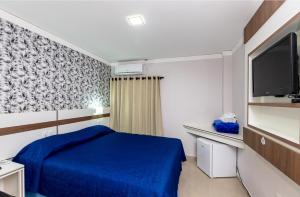 Postel nebo postele na pokoji v ubytování Hotel Trevita Foz
