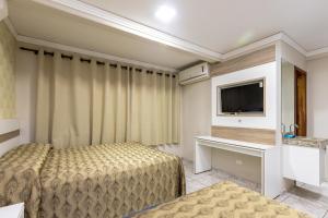 Postel nebo postele na pokoji v ubytování Hotel Trevita Foz