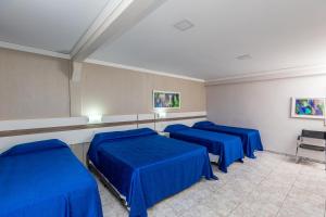 TV a/nebo společenská místnost v ubytování Hotel Trevita Foz