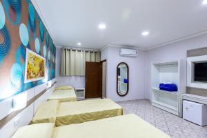 Postel nebo postele na pokoji v ubytování Hotel Trevita Foz