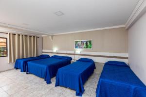 Postel nebo postele na pokoji v ubytování Hotel Trevita Foz