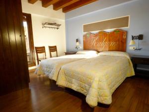 Hotel rural reina Berta客房内的一张或多张床位