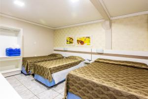 Postel nebo postele na pokoji v ubytování Hotel Trevita Foz