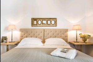 Postel nebo postele na pokoji v ubytování Elegante & Exclusive Maison