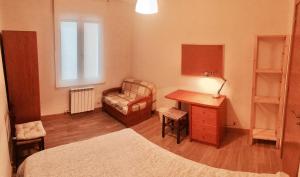 A bed or beds in a room at Betiko