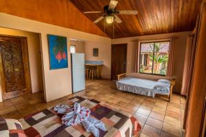 Ein Bett oder Betten in einem Zimmer der Unterkunft Hotel Nepenthe B&B
