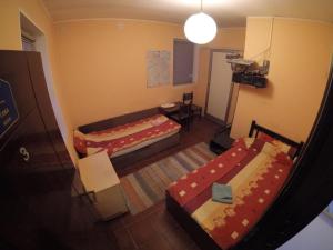 an overhead view of a room with two beds at Hostel Respect in Pančevo