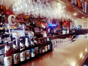 a bar with a lot of bottles of alcohol at Hotel Sonia Chipude in El Cercado